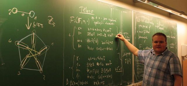 pavel writing on blackboard