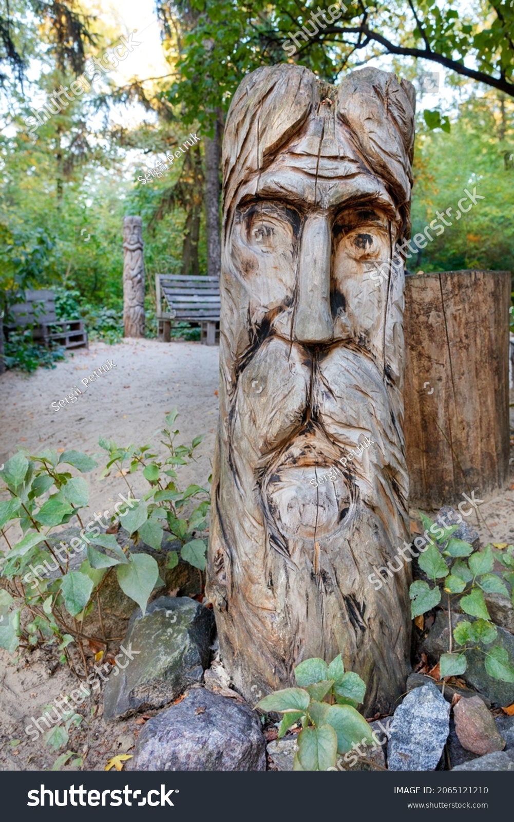 stock-photo-slavic-pagan-wooden-idol-in-the-forest-wooden-statue-the-image-of-the-slavic-god-attribute-of-2065121210