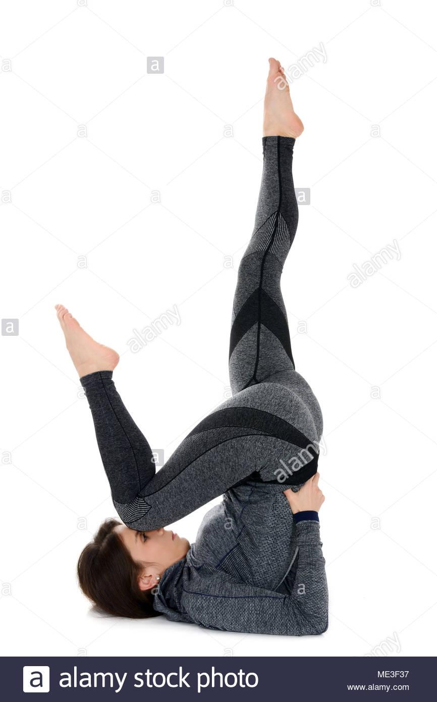 young-woman-doing-yoga-asana-sarvangasana-the-shoulder-stand-pose-the-candle-pose-ME3F37