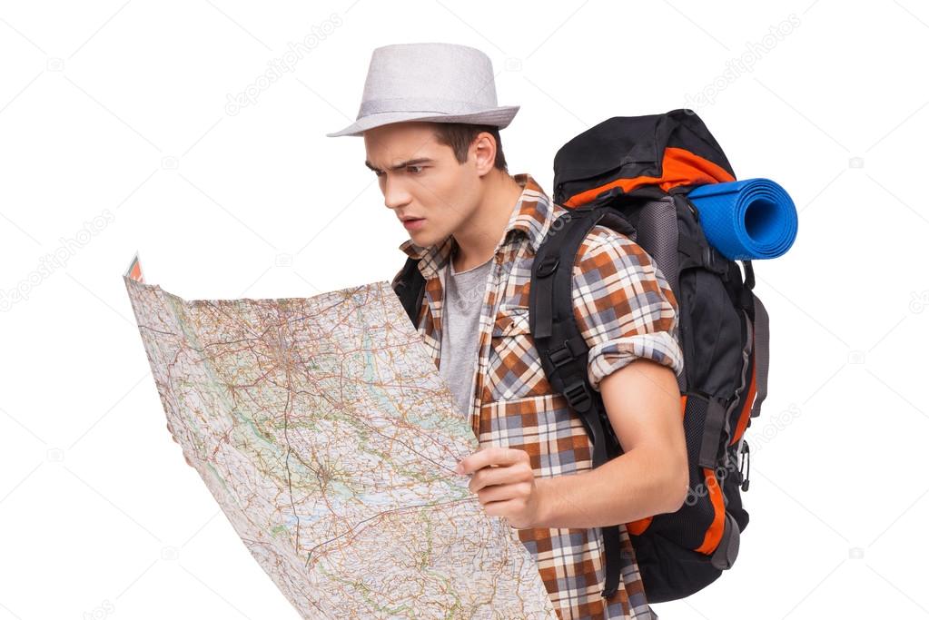 depositphotos 53472135-stock-photo-lost-tourist-with-map
