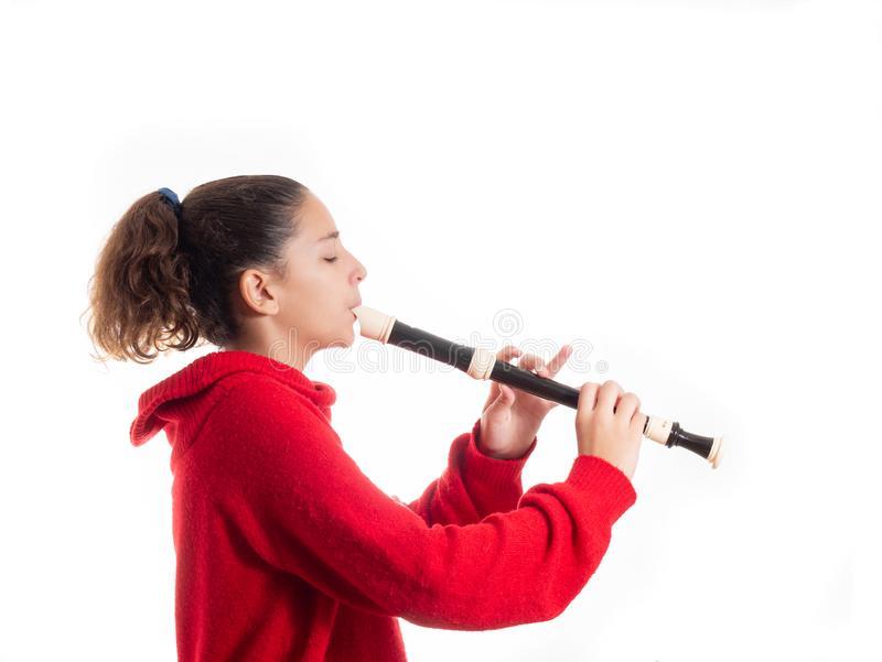 teenage-girl-playing-recorder-flute-portrait-teenage-girl-playing-recorder-isolated-white-background-162294040